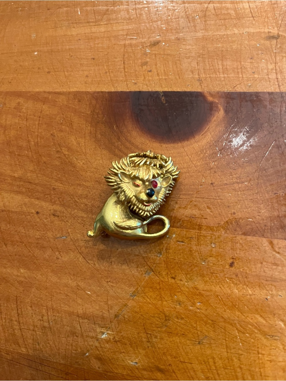 Gold Lion Brooch with Colored Gem Eyes